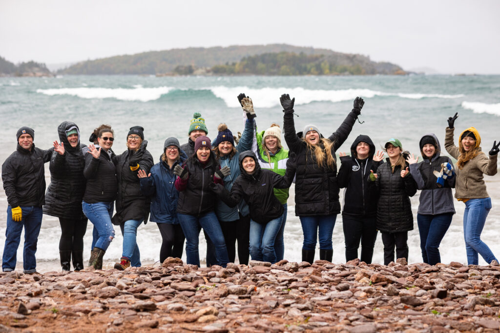 Honor staff volunteering at a beach clean up